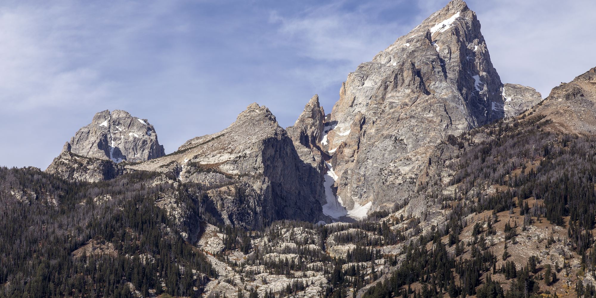The Grand Teton mountain range at golden hour